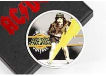 This officially licensed coin is struck from 1/2oz of fine silver to a proof finish and features the cover of AC/DC's first album High Voltage - Angus Young in his iconic schoolboy outfit. EL: 5000.