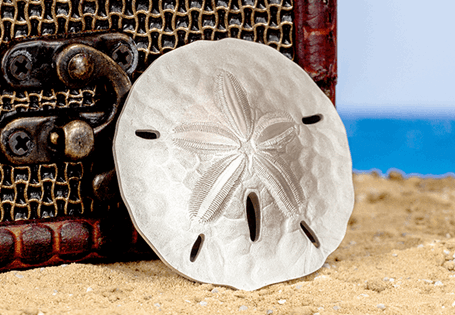 This Domed Sand Dollar has been struck from .999 Pure Silver to a high relief and Silk finish. Just 2,019 coins have been issued.