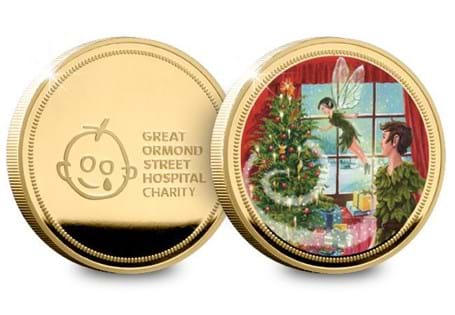 24 Carat Gold-Plated Peter Pan Christmas Commemorative featuring a colour image of Peter Pan and Tinker Bell decorating a Christmas Tree. 10% GOSH donation. Presented in a Christmas card. EL. 2019