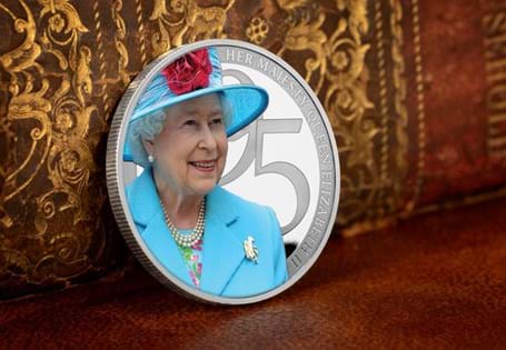 This coin has been issued to honour the Queen's 95th Birthday and features a photograph of Her Majesty the Queen in 2010 on a visit to Scarborough. Issued by Jersey.