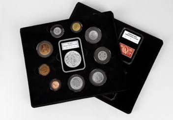 The QEII Platinum Jubilee Coin and Stamp Collection on white surface