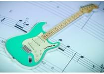 This 1oz Pure Silver Guitar shaped coin captures the retro Fender Guitar perfectly. Officially licensed by Fender Stratocaster in Surf Green. Arrive in Custom box. EL: 2,500