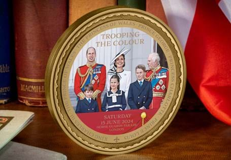 This 100mm Commemorative has been issued to commemorate Trooping the Colour and His Majesty's official birthday. The artwork features the Royal Family on the balcony by Jean-Michel Girard. 